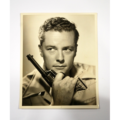 372 - An autographed and dedicated Studio photograph of Holywood Legend Tim Holt