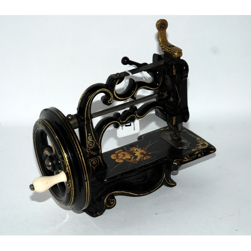 375 - A Victorian miniature sewing machine by Charles Raymond