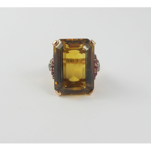 57 - A 1940's citrine ruby and diamond cocktail ring.