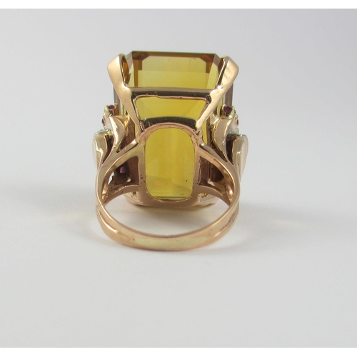 57 - A 1940's citrine ruby and diamond cocktail ring.