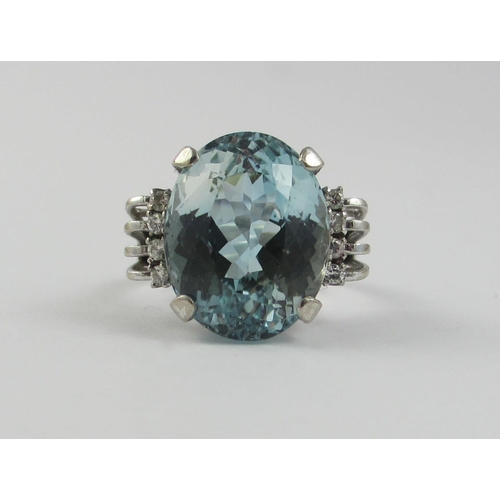 72 - A blue topaz set ring