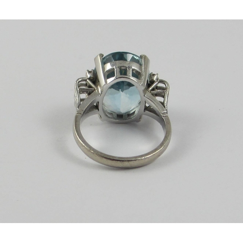 72 - A blue topaz set ring