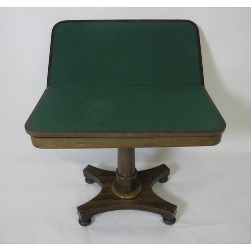 827 - A William IV rosewood fold over card table