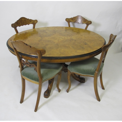 830 - A Victorian walnut inlaid loo table