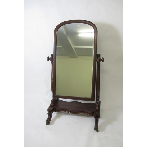 832 - A Victorian mahogany cheval mirror