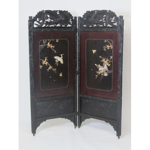 841 - A Japanese carved two fold screen