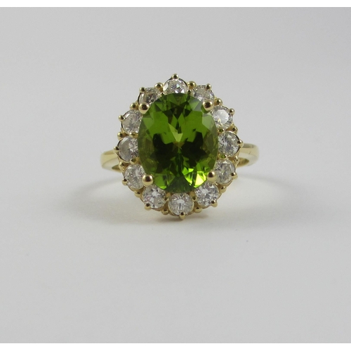 85 - A peridot and diamond ring