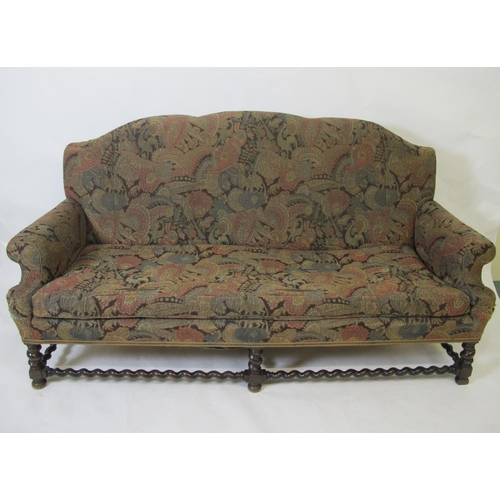 870 - A stained beech framed upholstered settee