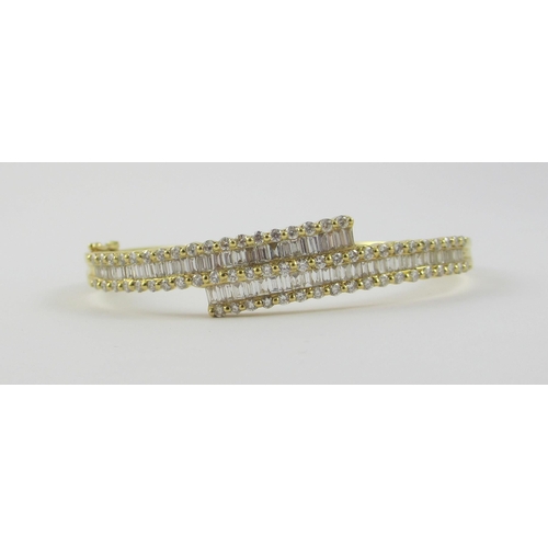 93 - A channel set diamond bangle