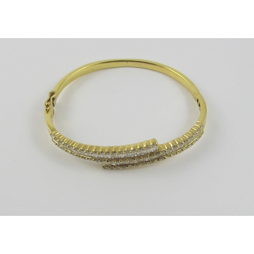 93 - A channel set diamond bangle