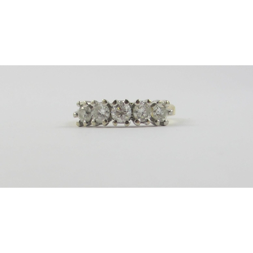 99 - An 18ct five stone diamond ring