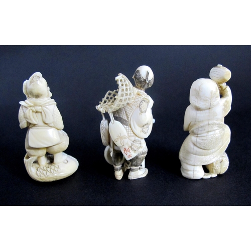 504 - Three Japanese ivory figures comprising;