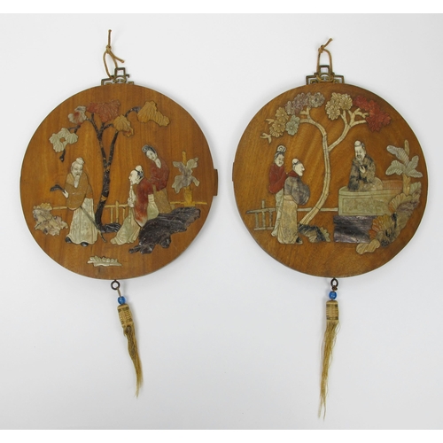 509 - A pair of Chinese circular wood plaques