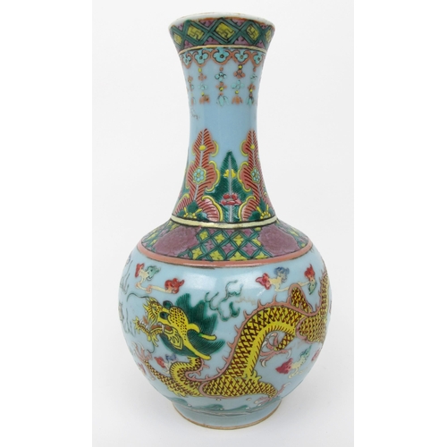 511 - A Chinese lilac ground baluster vase