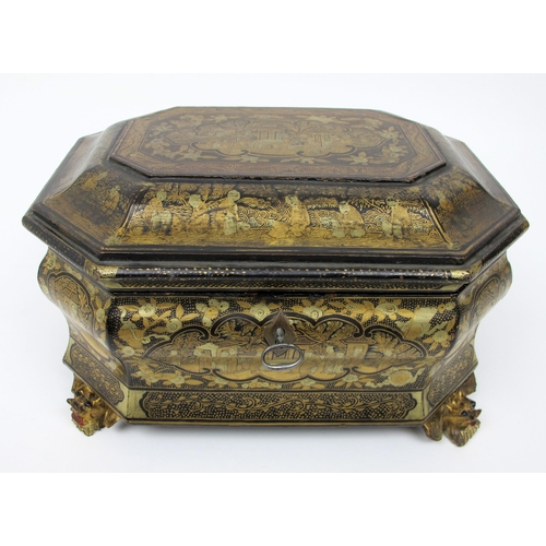 512 - A Chinese export black and gold lacquered octagonal bombe tea caddy