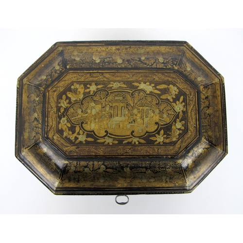 512 - A Chinese export black and gold lacquered octagonal bombe tea caddy