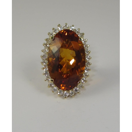 52 - A citrine and diamond ring