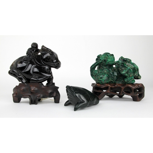 520 - A Malachite carving of a Buddhistic lion and a cub