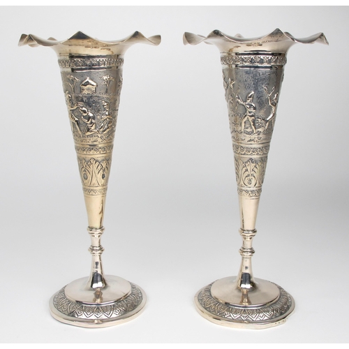 528 - A pair of Burmese silver spill vases