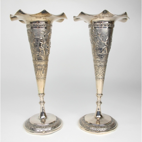 528 - A pair of Burmese silver spill vases