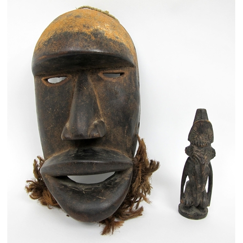 531 - An African carved wood face mask