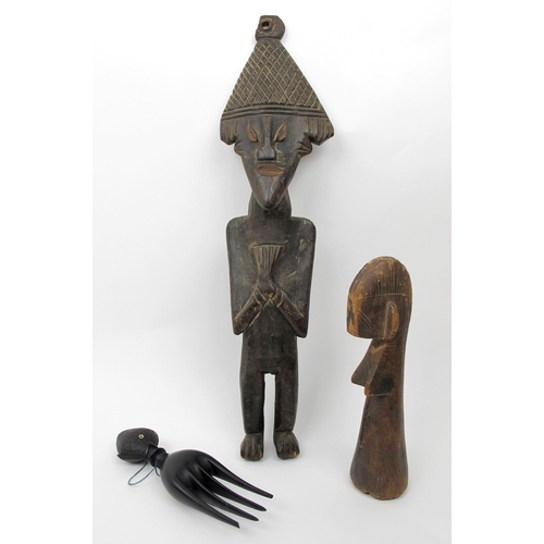 535 - An African carved wood standing figure