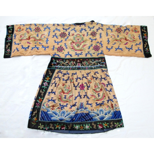 552 - A Chinese silk cream ground robe