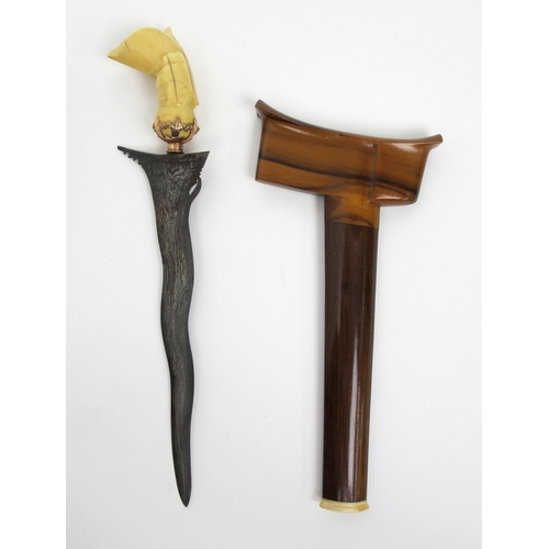 557 - A Malaysian Kris with ivory carved handle