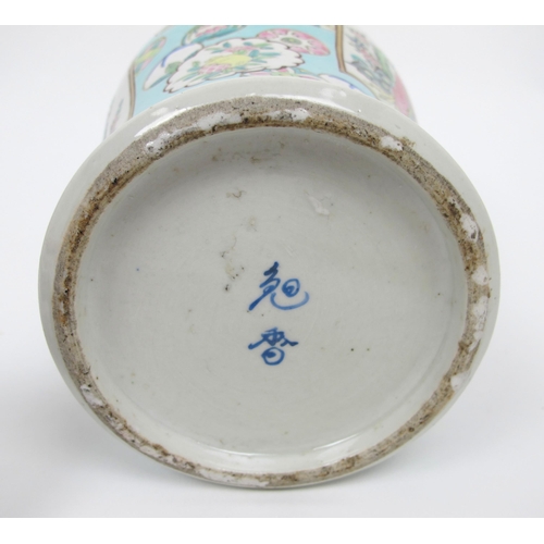 565 - A pair of Cantonese famille rose baluster jars and covers