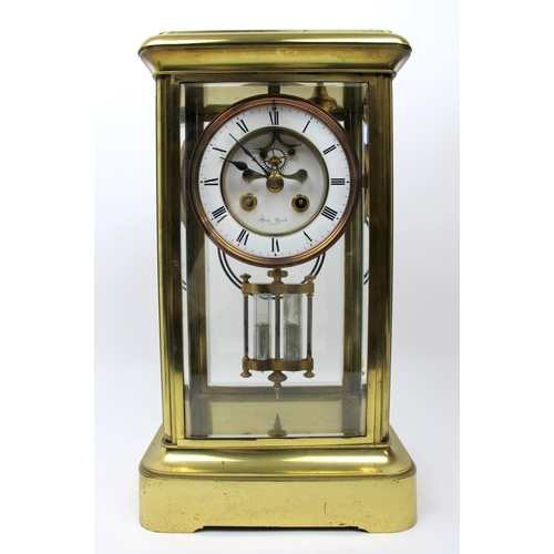 631 - A French gilt metal mercury pendulum mantel clock