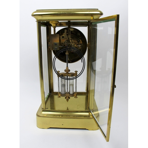 631 - A French gilt metal mercury pendulum mantel clock