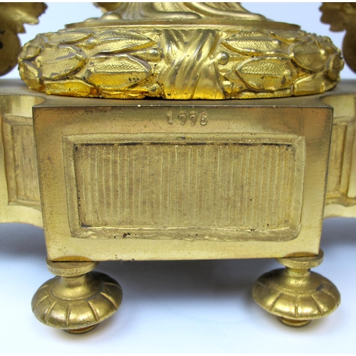 632 - A Louis XVI style gilt metal and porcelain mantle clock