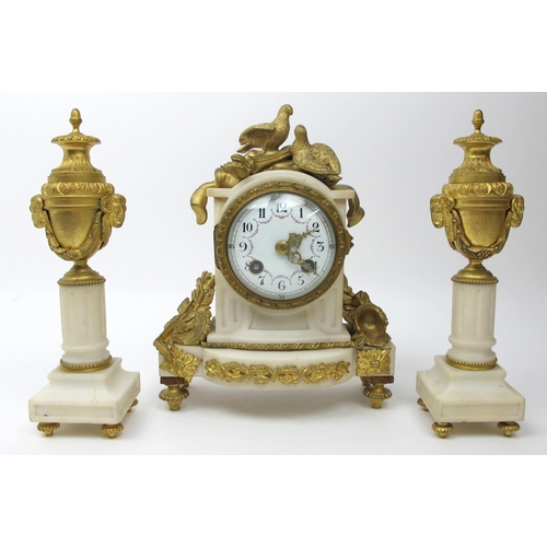 633 - A French gilt metal and white marble three piece clock garniture