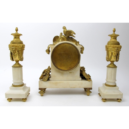 633 - A French gilt metal and white marble three piece clock garniture