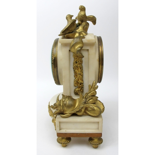 633 - A French gilt metal and white marble three piece clock garniture