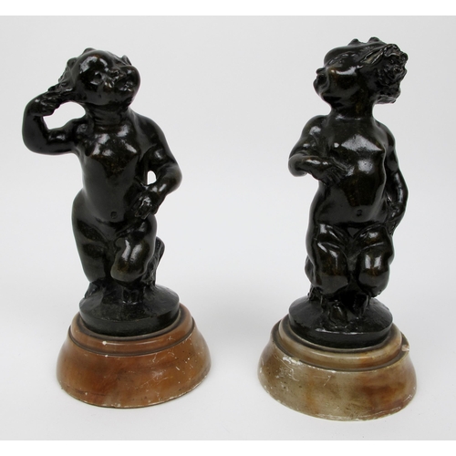 635 - A pair of bronze fauns