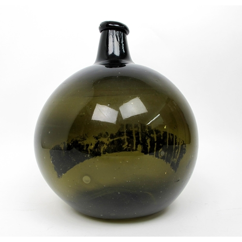 645 - An early 19th Century chemists green glass bottle