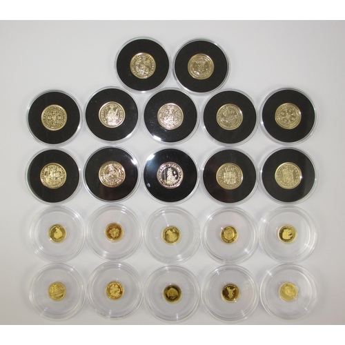 65 - A collection of replica coins in 9ct and 24ct