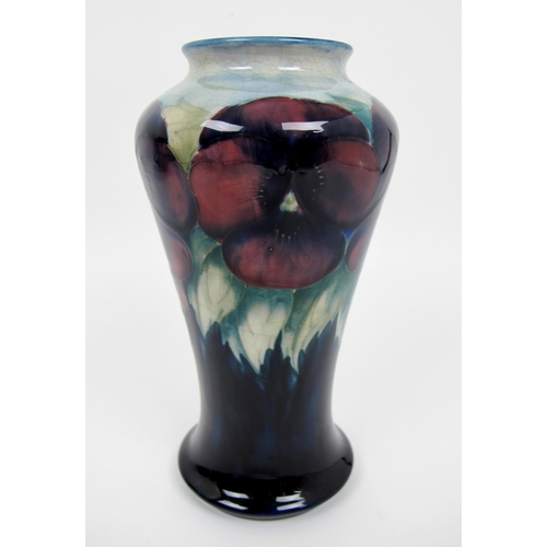 660 - A Moorcroft pottery Pansy vase c.1935