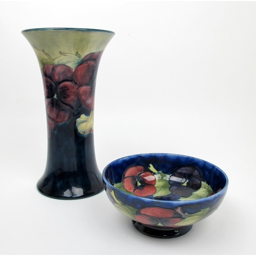 661 - A Moorcroft pottery Pansy vase c.1920