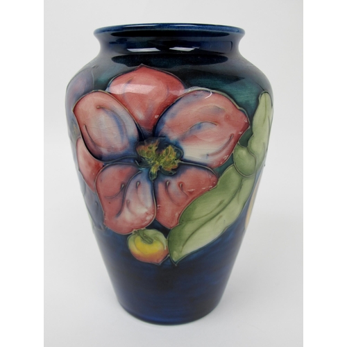 666 - A Moorcroft pottery clematis vase