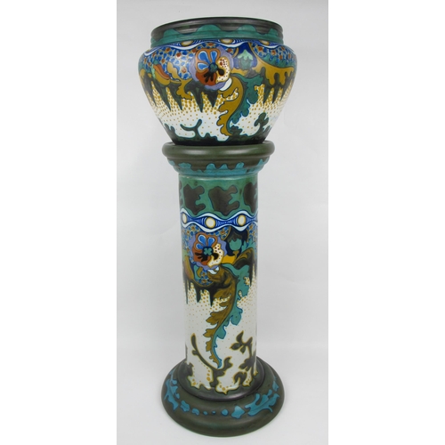 672 - A large Gouda pottery Art Nouveau Corona Jardiniere and stand