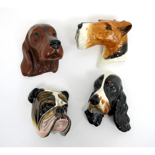 681 - Four Crown Devon pottery dog wall masks