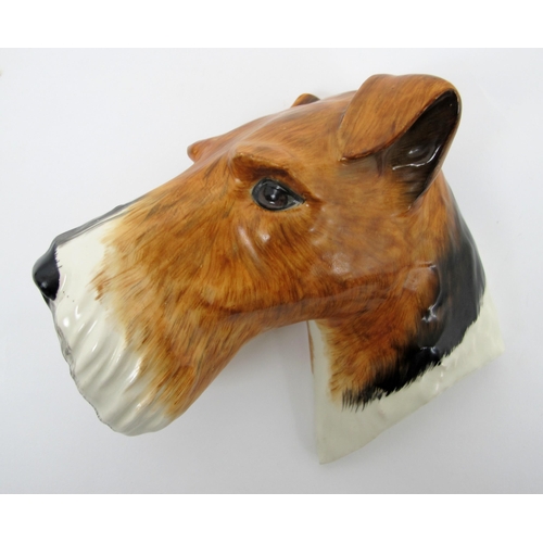 681 - Four Crown Devon pottery dog wall masks