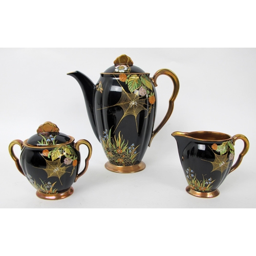 692 - A Carlton Ware spider web coffee set