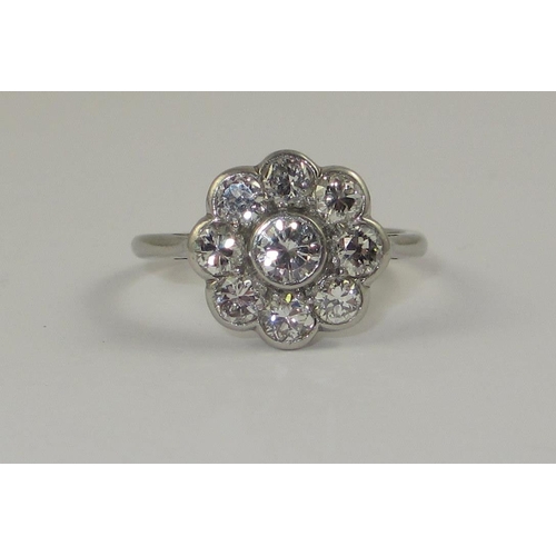 71 - A platinum diamond flower ring