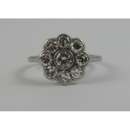 71 - A platinum diamond flower ring