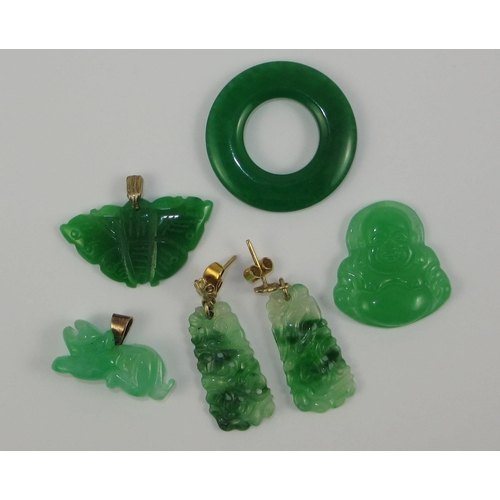 73 - A collection of jade and green hard stone