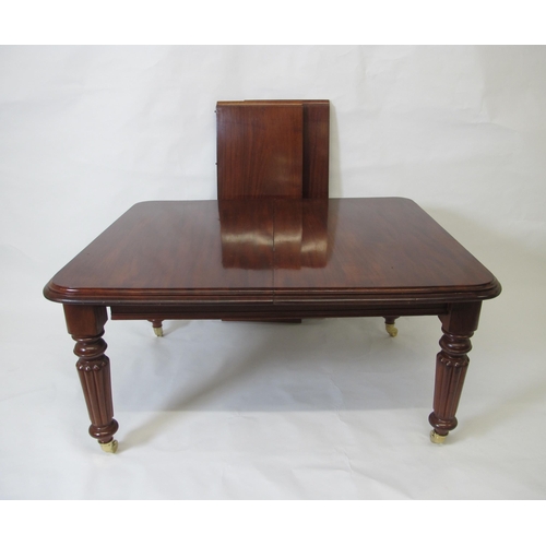 745 - A Victorian mahogany extending dining table