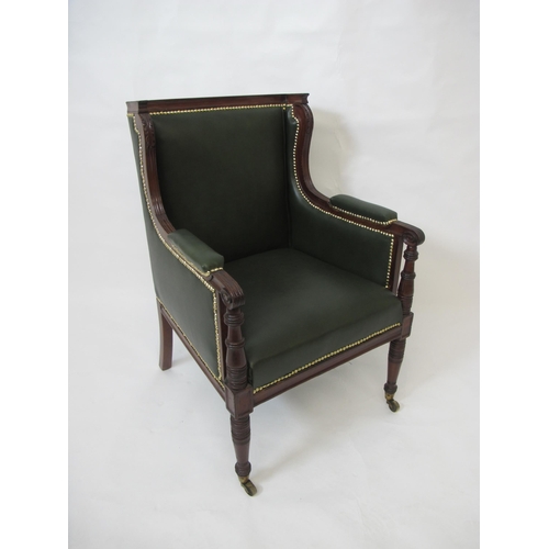 749 - An early 20th Century mahogany library armchair in the Regency manner